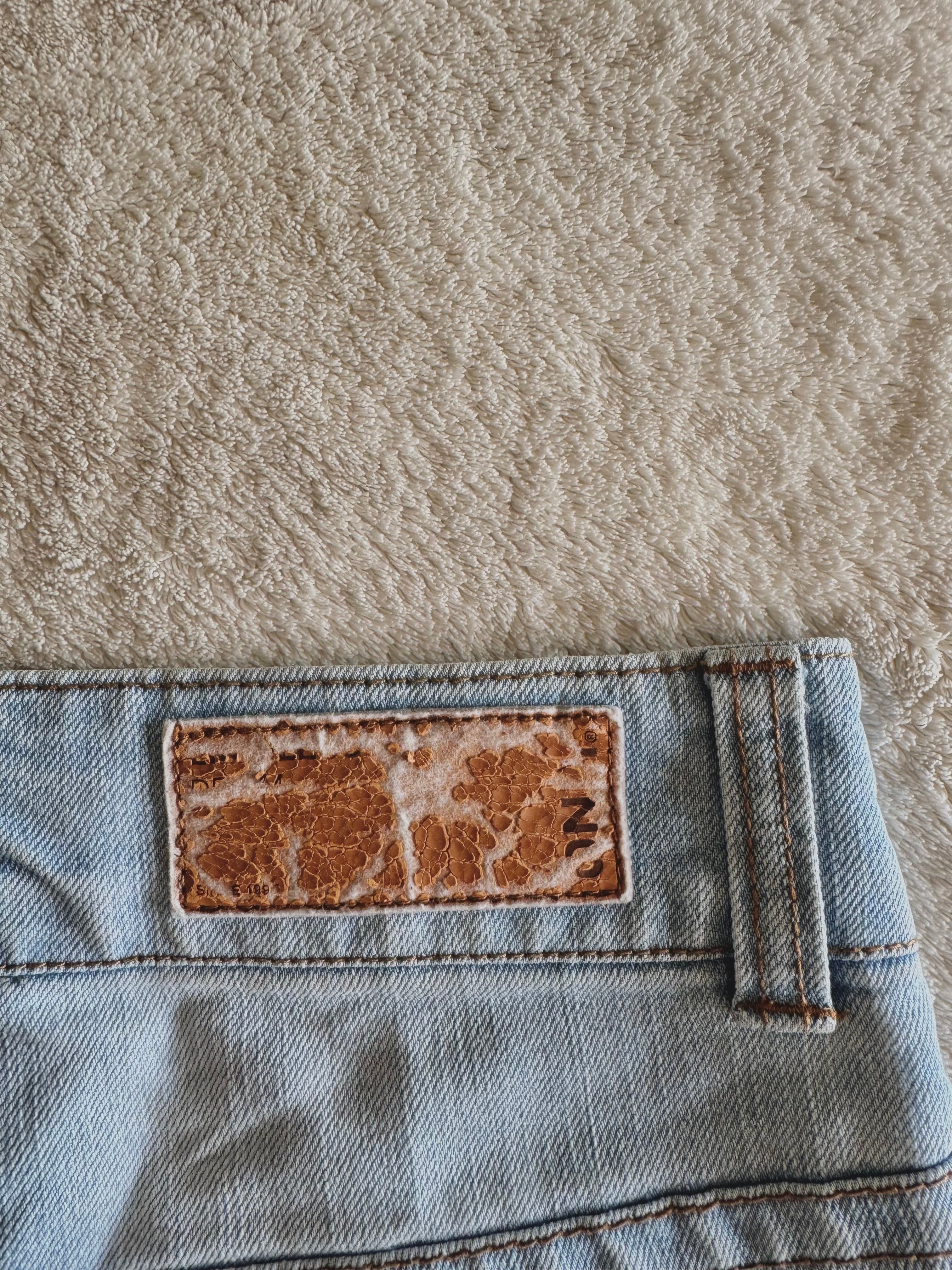 y2k vintage low waisted light was denim micro mini shorts with buckles
