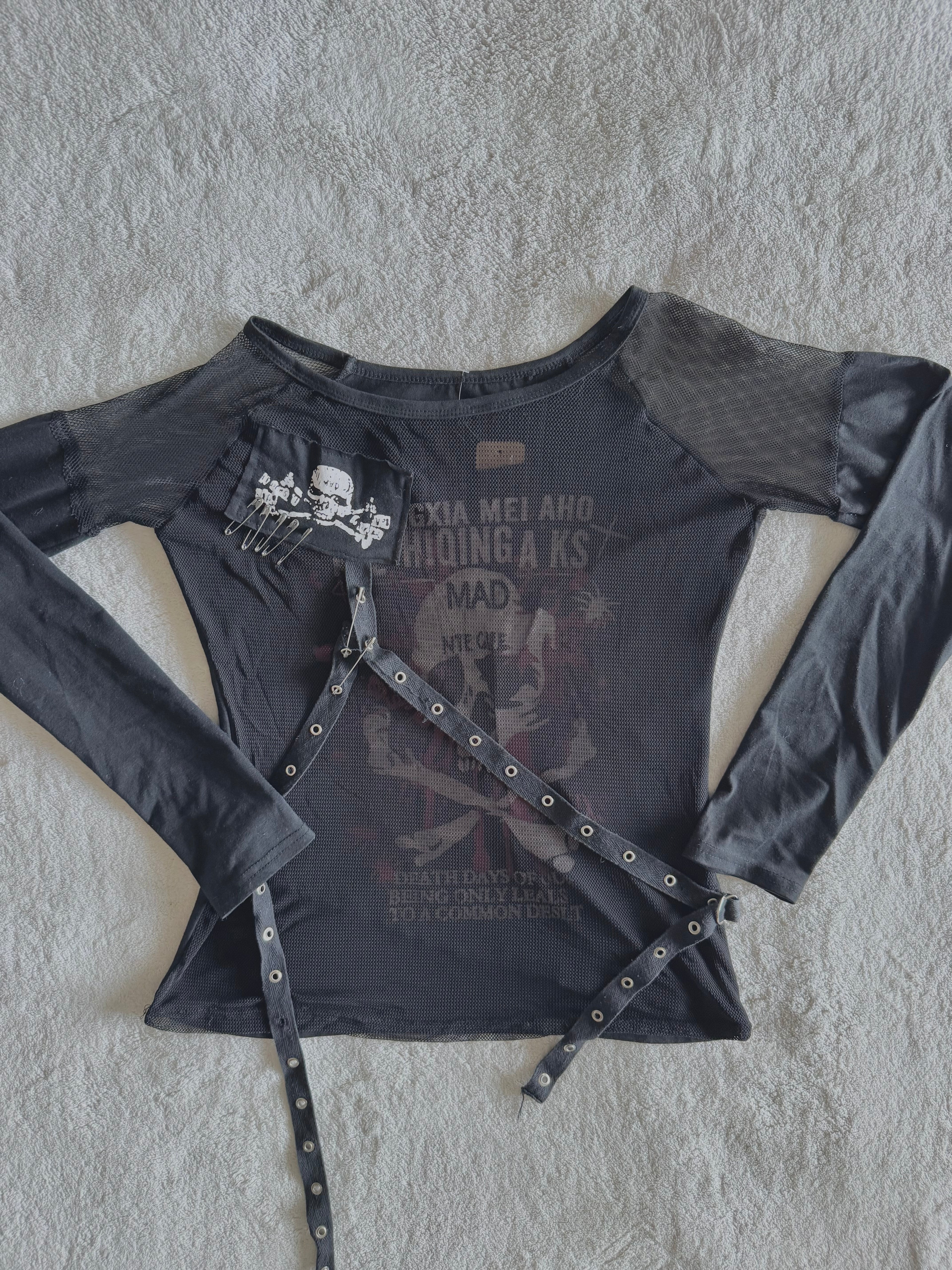 y2k vintage graphic skull print long sleeved top with sheer panels and grommet tassels emo